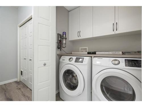 101-360 Harvest Hills Common Ne, Calgary, AB - Indoor Photo Showing Laundry Room