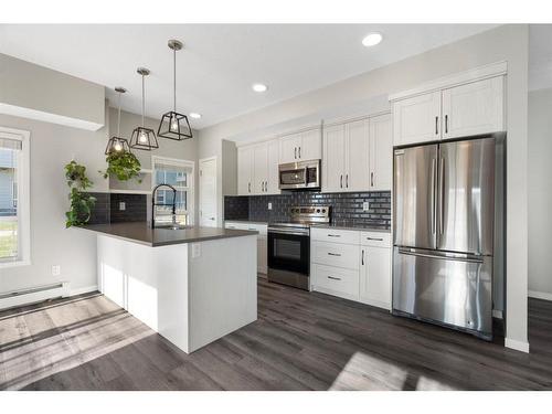 101-360 Harvest Hills Common Ne, Calgary, AB - Indoor Photo Showing Kitchen With Stainless Steel Kitchen With Upgraded Kitchen