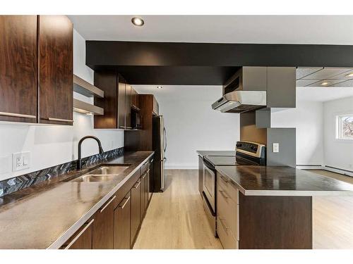 8-1530 26 Avenue Sw, Calgary, AB - Indoor Photo Showing Kitchen With Double Sink