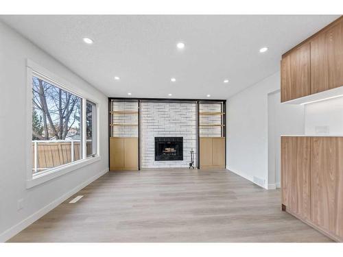 287 Hawk Wood Drive Nw, Calgary, AB - Indoor With Fireplace