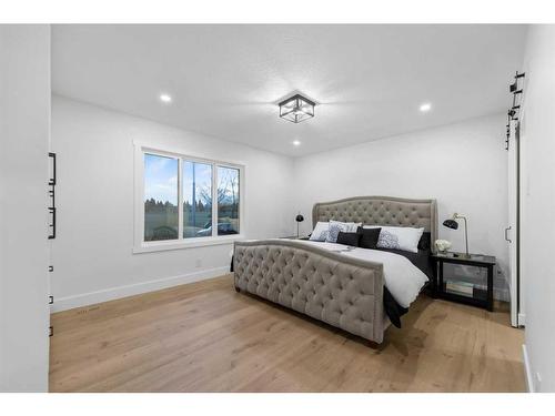 1160 Lake Twintree Drive Se, Calgary, AB - Indoor Photo Showing Bedroom