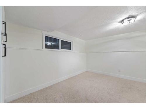 1160 Lake Twintree Drive Se, Calgary, AB - Indoor Photo Showing Other Room