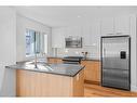 218-510 Edmonton Trail Ne, Calgary, AB  - Indoor Photo Showing Kitchen With Stainless Steel Kitchen 