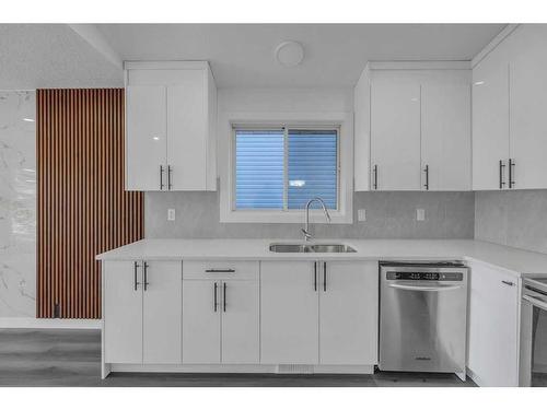 108 Martinwood Way Ne, Calgary, AB - Indoor Photo Showing Kitchen With Double Sink