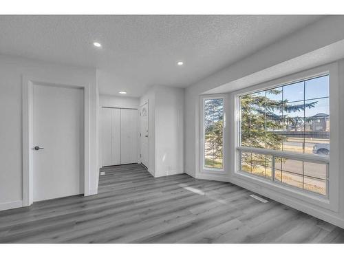 108 Martinwood Way Ne, Calgary, AB - Indoor Photo Showing Other Room