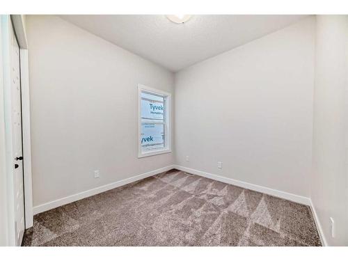 35 Versant View Sw, Calgary, AB - Indoor Photo Showing Other Room