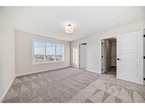 35 Versant View Sw, Calgary, AB - Indoor Photo Showing Other Room