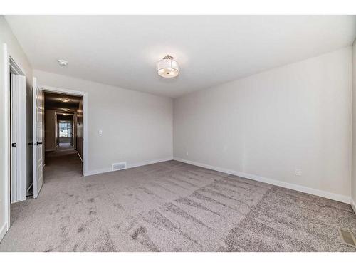 35 Versant View Sw, Calgary, AB - Indoor Photo Showing Other Room