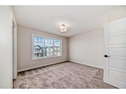 35 Versant View Sw, Calgary, AB - Indoor Photo Showing Other Room