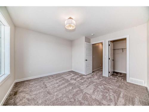 35 Versant View Sw, Calgary, AB - Indoor Photo Showing Other Room