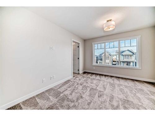 35 Versant View Sw, Calgary, AB - Indoor Photo Showing Other Room