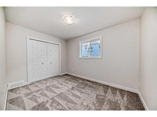 35 Versant View Sw, Calgary, AB - Indoor Photo Showing Other Room