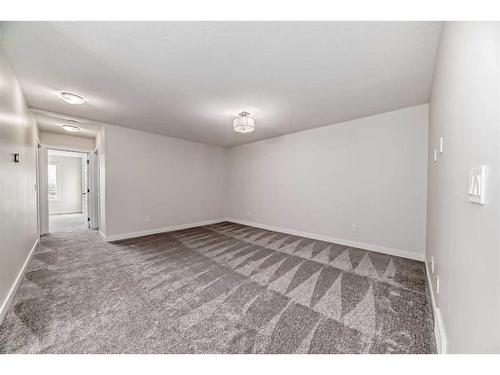 35 Versant View Sw, Calgary, AB - Indoor Photo Showing Other Room