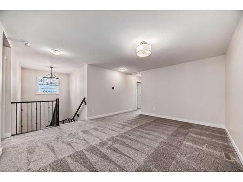 35 Versant View Sw, Calgary, AB - Indoor Photo Showing Other Room