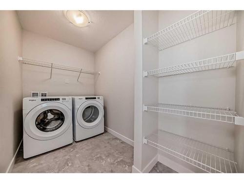 35 Versant View Sw, Calgary, AB - Indoor Photo Showing Laundry Room