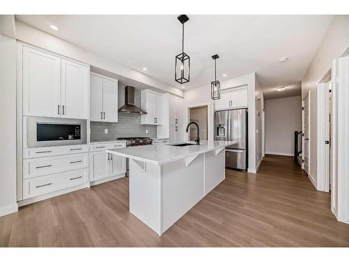 35 Versant View Sw, Calgary, AB - Indoor Photo Showing Kitchen With Upgraded Kitchen