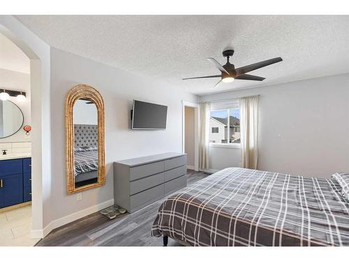 170 River Rock Place Se, Calgary, AB - Indoor Photo Showing Bedroom