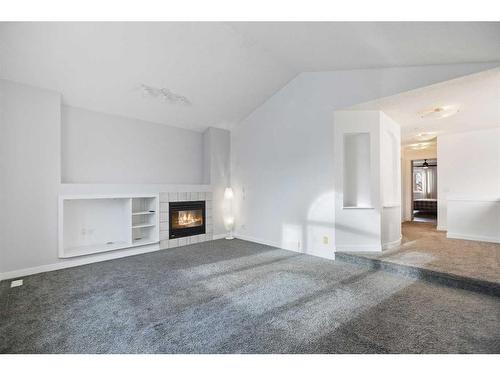 170 River Rock Place Se, Calgary, AB - Indoor With Fireplace