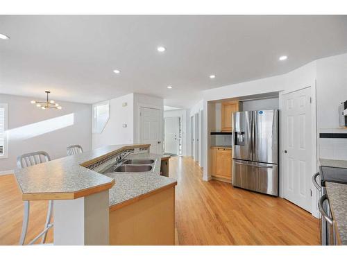 170 River Rock Place Se, Calgary, AB - Indoor Photo Showing Kitchen With Stainless Steel Kitchen With Double Sink