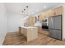 301-20 Sage Hill Walk Nw, Calgary, AB  - Indoor Photo Showing Kitchen With Stainless Steel Kitchen With Upgraded Kitchen 