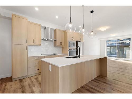 301-20 Sage Hill Walk Nw, Calgary, AB - Indoor Photo Showing Kitchen With Upgraded Kitchen