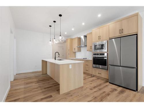 301-20 Sage Hill Walk Nw, Calgary, AB - Indoor Photo Showing Kitchen With Stainless Steel Kitchen With Upgraded Kitchen