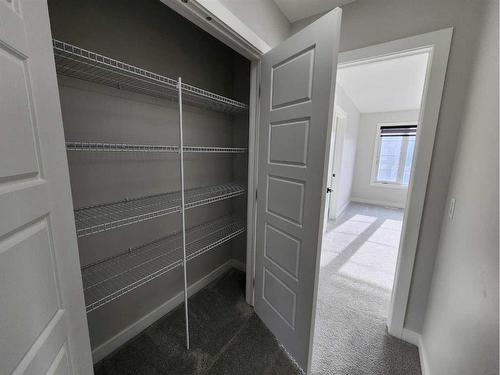 162 Ambleton Drive Nw, Calgary, AB - Indoor With Storage