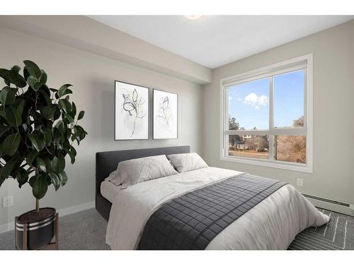 320-1605 17 Street Se, Calgary, AB - Indoor Photo Showing Bedroom