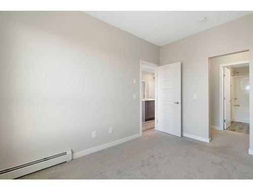 320-1605 17 Street Se, Calgary, AB - Indoor Photo Showing Other Room