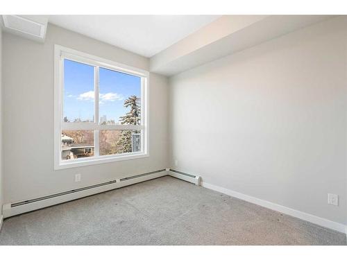 320-1605 17 Street Se, Calgary, AB - Indoor Photo Showing Other Room