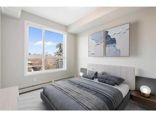 320-1605 17 Street Se, Calgary, AB - Indoor Photo Showing Bedroom