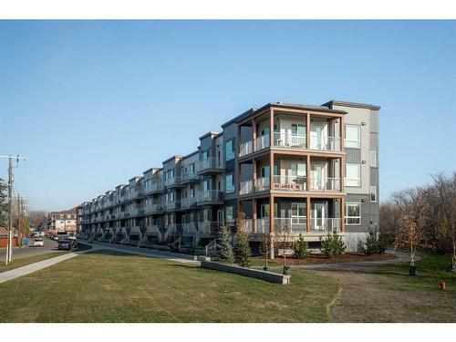 320-1605 17 Street Se, Calgary, AB - Outdoor With Balcony With Facade