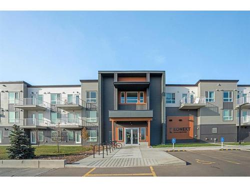 320-1605 17 Street Se, Calgary, AB - Outdoor With Balcony With Facade