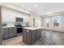 320-1605 17 Street Se, Calgary, AB  - Indoor Photo Showing Kitchen With Stainless Steel Kitchen With Upgraded Kitchen 