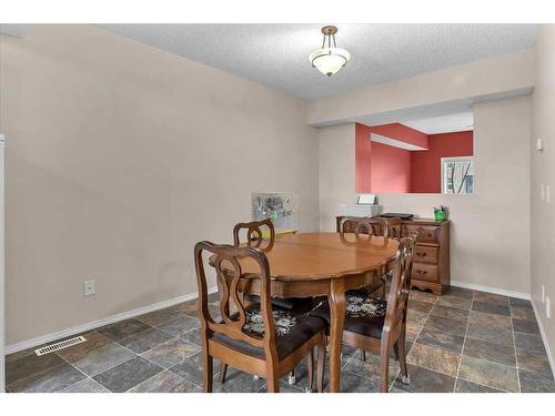 38-7 Westland Road, Okotoks, AB - Indoor Photo Showing Dining Room