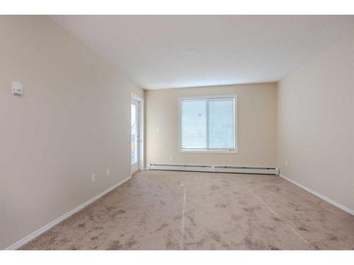 305-7180 80 Avenue Ne, Calgary, AB - Indoor Photo Showing Other Room