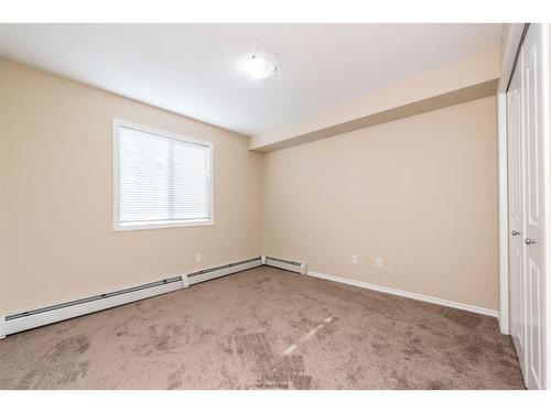 305-7180 80 Avenue Ne, Calgary, AB - Indoor Photo Showing Other Room