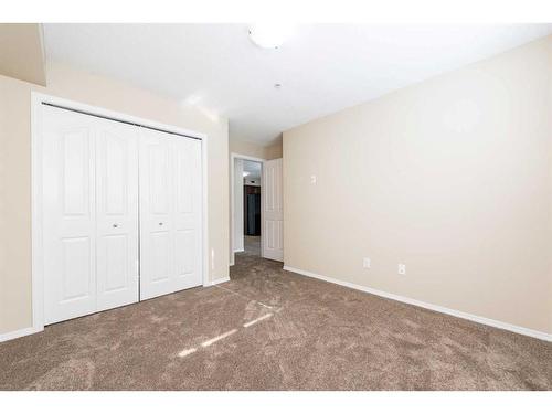 305-7180 80 Avenue Ne, Calgary, AB - Indoor Photo Showing Other Room