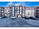 305-7180 80 Avenue Ne, Calgary, AB  - Outdoor With Balcony With Facade 