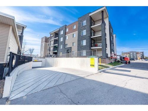 305-7180 80 Avenue Ne, Calgary, AB - Outdoor With Balcony