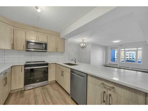 2202-6118 80 Avenue Ne, Calgary, AB - Indoor Photo Showing Kitchen With Stainless Steel Kitchen With Upgraded Kitchen