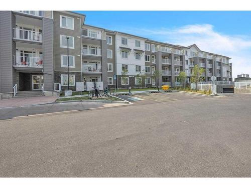 2202-6118 80 Avenue Ne, Calgary, AB - Outdoor With Balcony With Facade