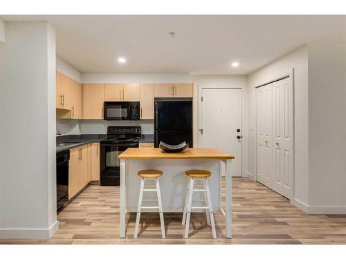 1232-2395 Eversyde Avenue Sw, Calgary, AB - Indoor Photo Showing Kitchen