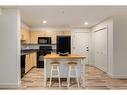 1232-2395 Eversyde Avenue Sw, Calgary, AB  - Indoor Photo Showing Kitchen 