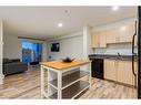 1232-2395 Eversyde Avenue Sw, Calgary, AB  - Indoor Photo Showing Kitchen With Double Sink 