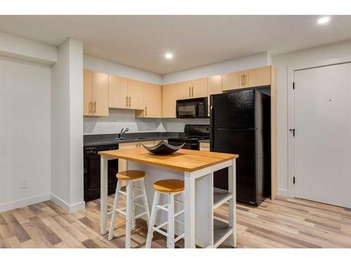 1232-2395 Eversyde Avenue Sw, Calgary, AB - Indoor Photo Showing Kitchen