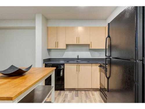 1232-2395 Eversyde Avenue Sw, Calgary, AB - Indoor Photo Showing Kitchen