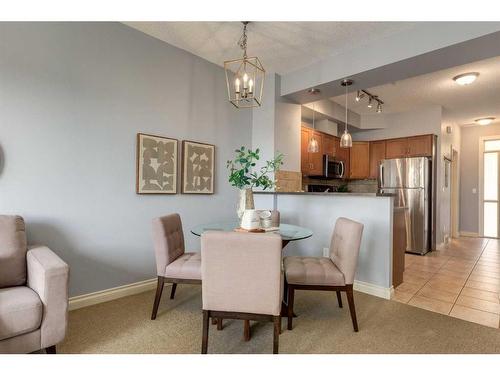 9-148 Rockyledge View Nw, Calgary, AB - Indoor Photo Showing Dining Room