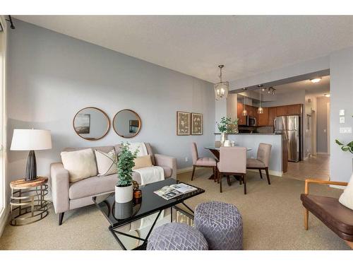 9-148 Rockyledge View Nw, Calgary, AB - Indoor Photo Showing Living Room