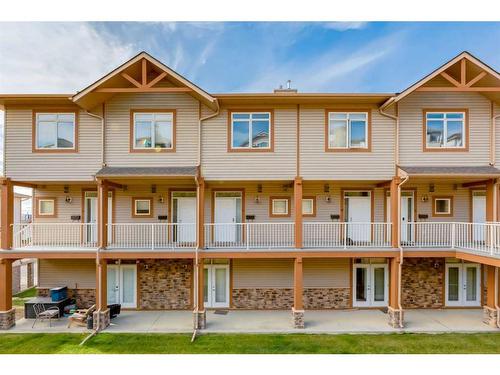 9-148 Rockyledge View Nw, Calgary, AB - Outdoor With Deck Patio Veranda With Facade